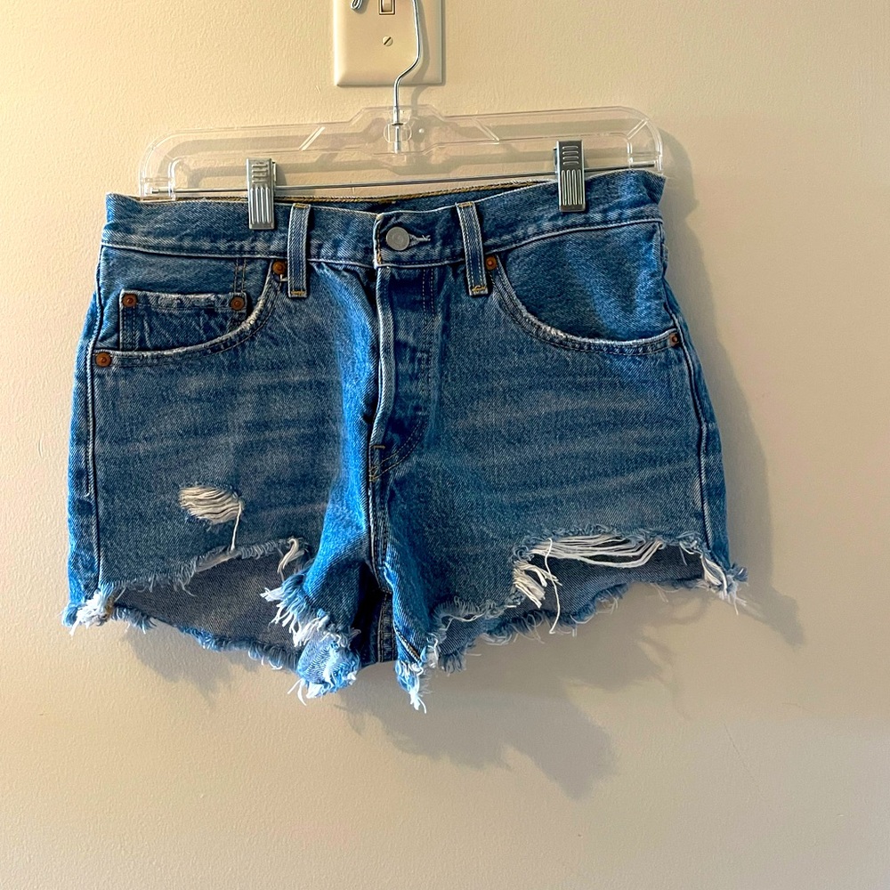 Levi’s 501 medium wash denim shorts.